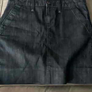 Benetton dark denim mini skirt with chains in pockets in size 44 or size L